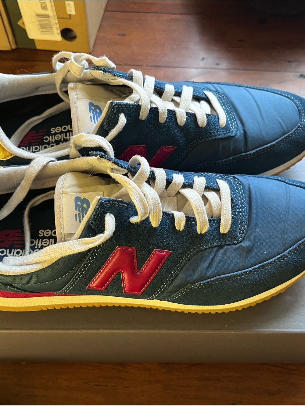 New Balance Men’s Navy and Red Low-Top Sneakers with Yellow Sole